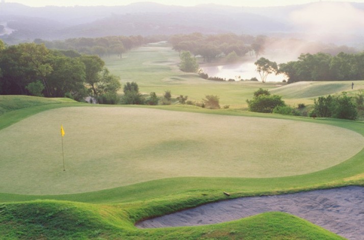 View at the world-class golf courses at Omni Barton Creek Resort & Spa in Austin, Texas in sunrise haze.