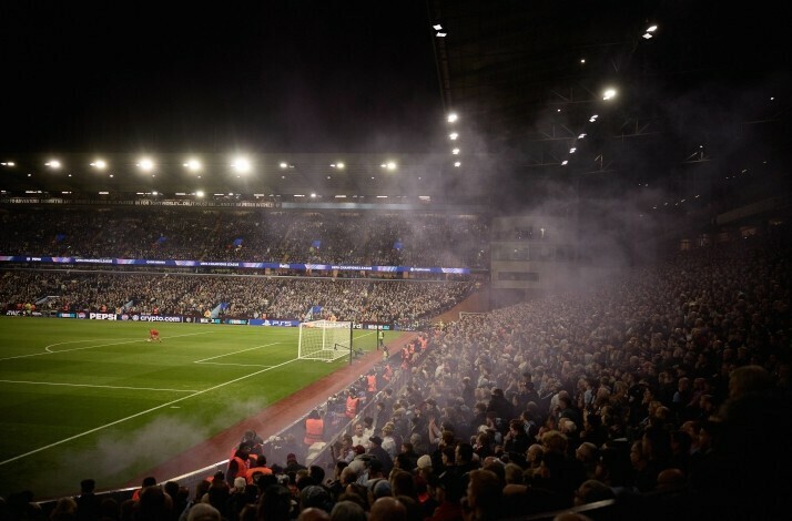 View of the stadium from a crowded stand.