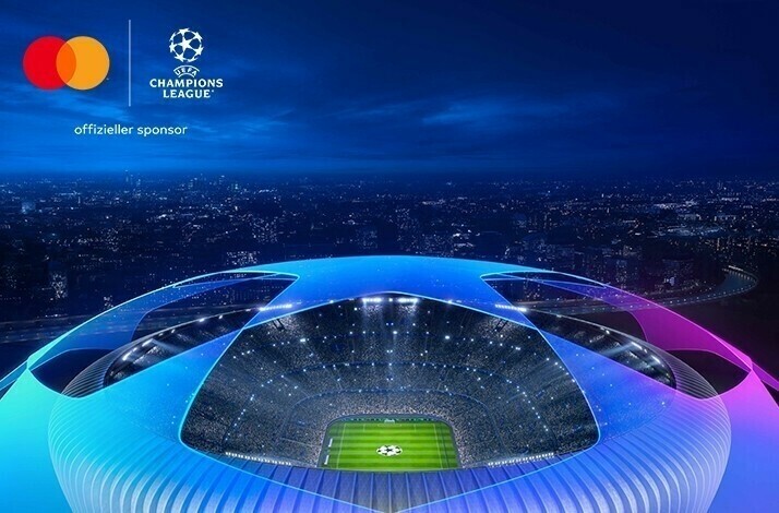 Bird’s-eye view at the football stadium. There is a joint logo of UEFA Champions League and Mastercard in the top left corner.