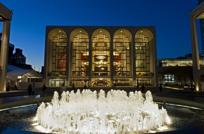 The Metropolitan opera house at night, featuring vibrant fountains at New York, USA. © Jonathan Tichler