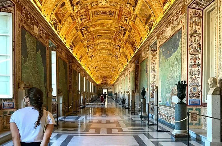 Visitors in the Gallery of Maps in Vatican.