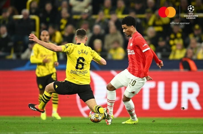 Players of Borussia Dortmund and PSV Eindhoven captured during an UEFA Champions League match